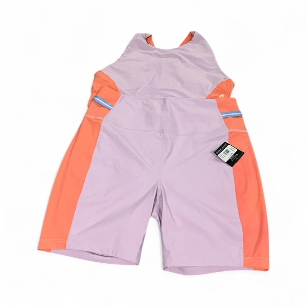 Two Pieces Of Eddie Bauer Lilac and Peach Sports Bra and shorts
